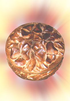 Round case, carved wood